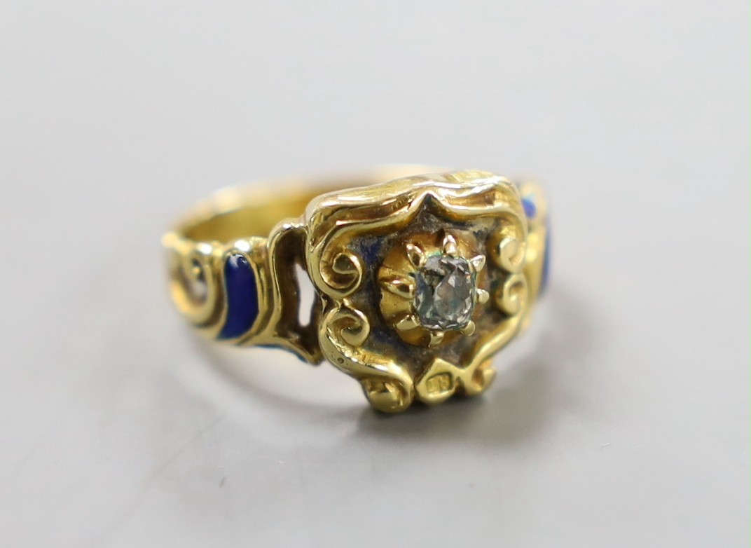 An early 19th century yellow metal (stamped 18), enamel and old cut diamond set ring, size J, gross weight 5.5 grams.